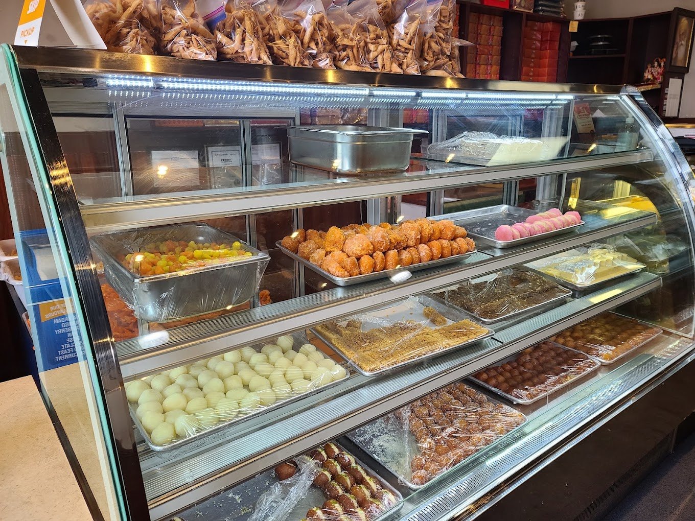 Spice of Punjab refrigerated sweets display counter